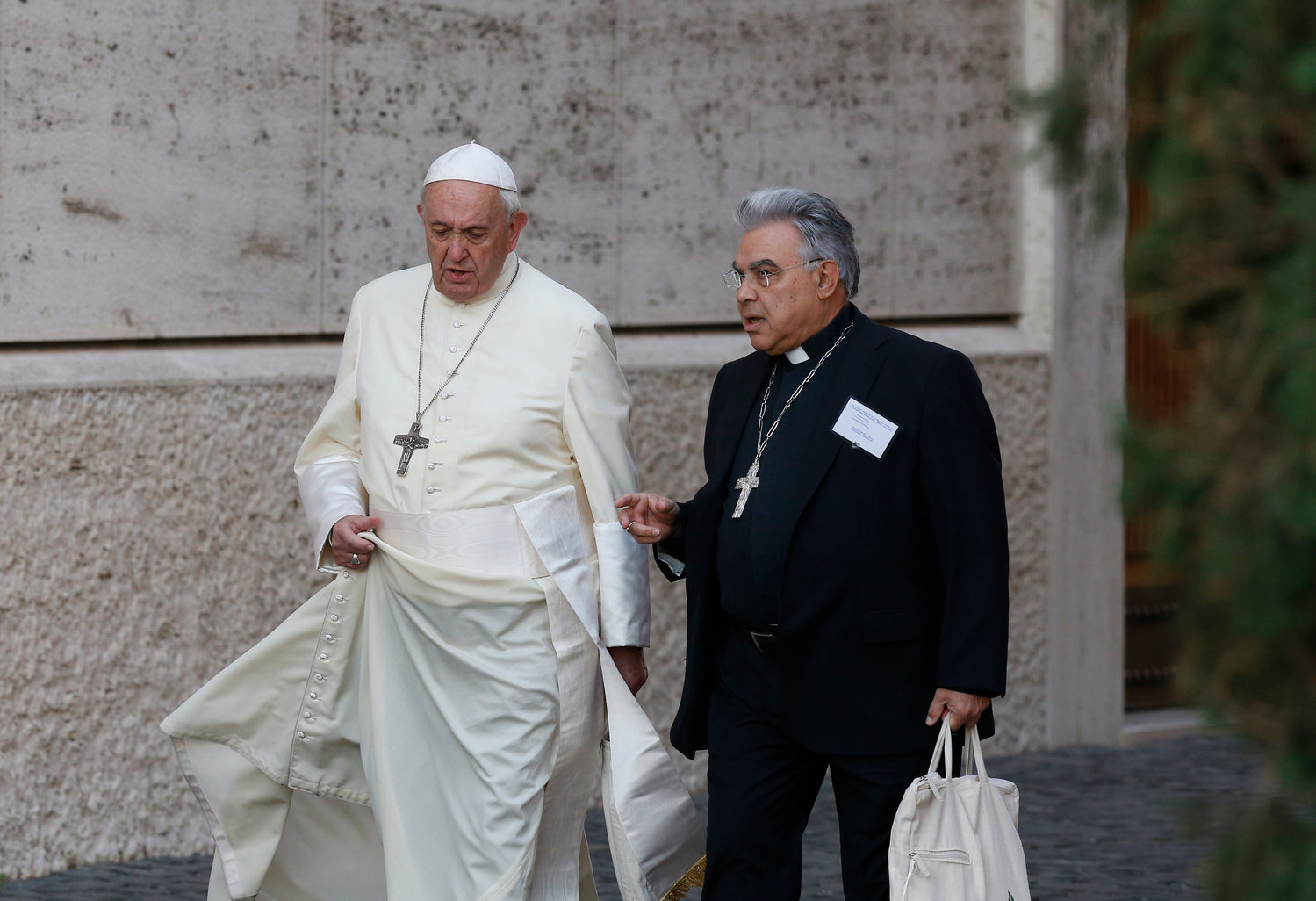 Pope Francis and Italian Bishop Marcello Semeraro of Albano arrive for a session of the Synod of Bishops for the Amazon at the Vatican Oct. 15, 2019.